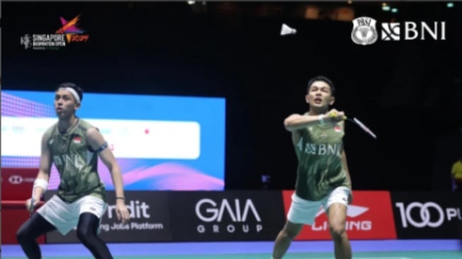 Tumbangkan Kim Asturp/Rasmussen, Fajar/Rian Segel Tiket Babak Final Singapore Open 2024