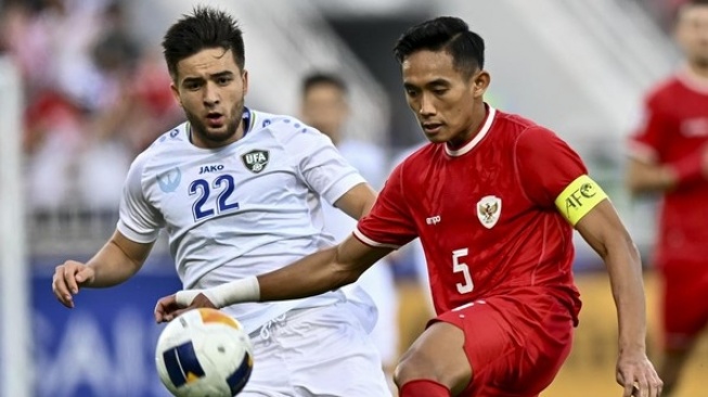 Rizky RIdho saat membela Timnas Indonesia U-23 di laga melawan Uzbekistan (the-afc.com)