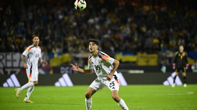 Gelandang Timnas Jerman, Aleksandar Pavlovic. [Tobias SCHWARZ / AFP]