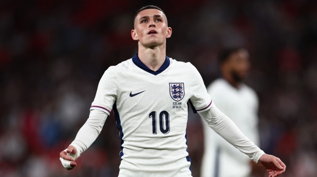 Gelandang serang Timnas Inggris, Phil Foden. [HENRY NICHOLLS / AFP]