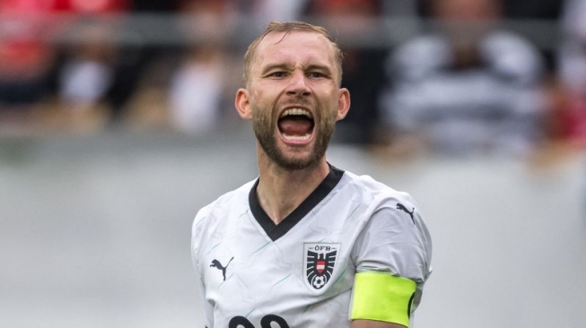 Kapten Austria Konrad Laimer. ANTARA/AFP/FABRICE COFFRINI