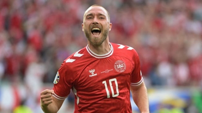 Gelandang Timnas Denmark, Christian Eriksen merayakan golnya di Euro 2024. [DAMIEN MEYER / AFP]