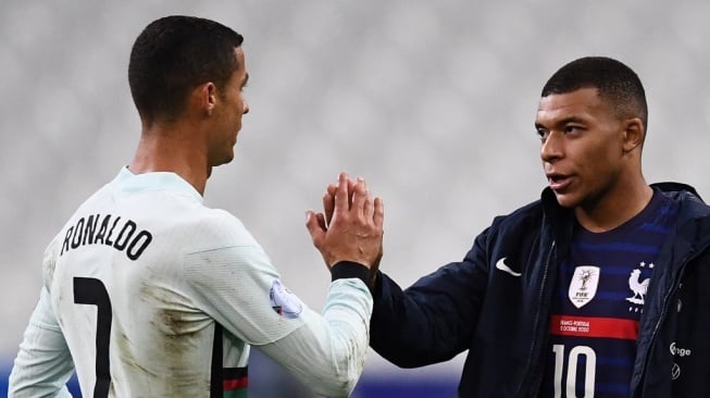 Cristiano Ronaldo dan Kylian Mbappe. [Dok. AFP]