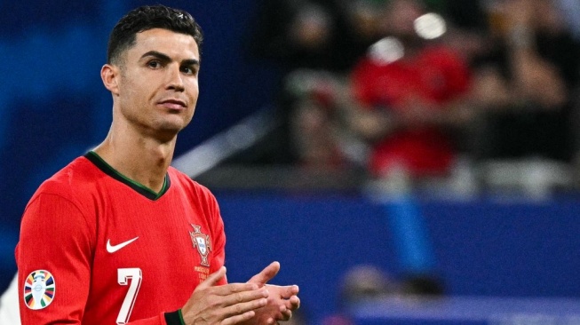 Penyerang Timnas Portugal, Cristiano Ronaldo tampil di Euro 2024. [JAVIER SORIANO / AFP]