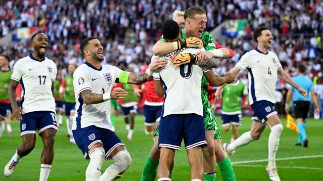 Timnas Inggris memastikan lolos ke semifinal Euro 2024 usai mengalahkan Swiss pada pertandingan di Dusseldorf Arena, Jerman, 6 Juli 2024. [INA FASSBENDER / AFP]