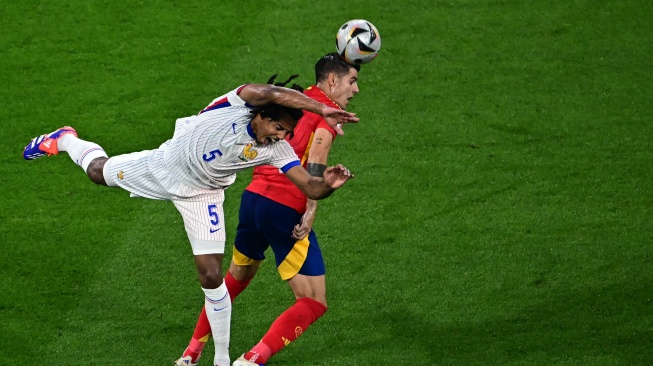 Babak semifinal Euro 2024 antara Spanyol vs Prancis yang berlangsung di Allianz Arena, Rabu (10/7/2024) pada babak pertama berakhir untuk keunggulan tim Matador. [Tobias SCHWARZ / AFP]