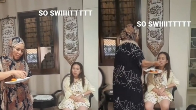 Potret ketika Ayu Ting Ting disuapi makan oleh Umi Kalsum sang ibu (Instagram/lambegosiip)