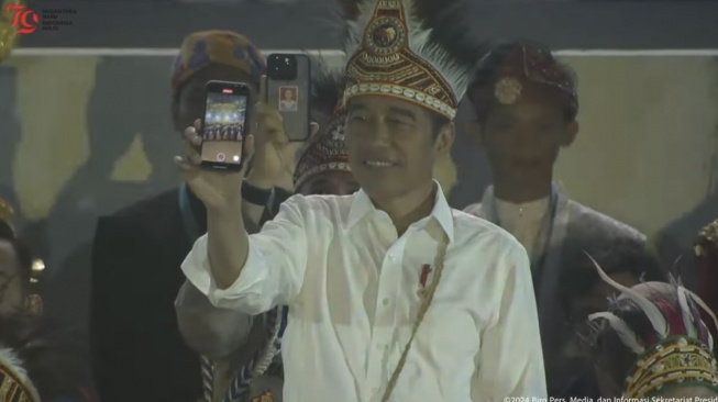 Presiden Joko Widodo (Jokowi) di peringatan Hari Anak Nasional ke-40 di Istora Papua Bangkit, Papua. (tangkapan layar/ist)