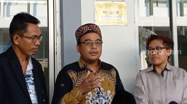 Ketua Riset dan Advokasi publik LBH PP Muhammadiyah, Gufroni di gedung KPAI. (Suara.com/Faqih)