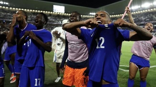 Dalam pertandingan perempat final Olimpiade Paris 2024 yang berlangsung sengit di Nouveau Stade de Bordeaux, Timnas Prancis U-23 berhasil mengamankan tiket ke babak semifinal setelah mengalahkan rival beratnya, Argentina U-23, dengan skor tipis 1-0. (AFP)