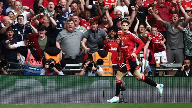 Pertandingan Community Shield antara Manchester City vs Manchester United di Stadion Wembley yang berlangsung Sabtu (10/8/2024) harus dilanjutkan lewat adu penalti setelah kedua tim bermain imbang 1-1. [HENRY NICHOLLS / AFP]