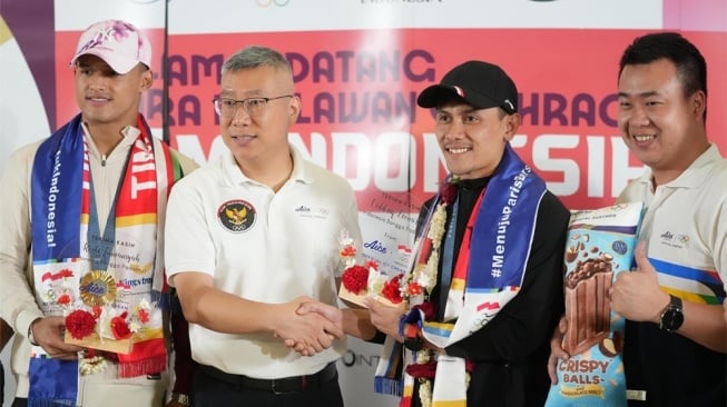 Apresiasi terhadap dua atlet peraih medali emas Olimpiade 2024, Veddriq Leonardo (panjat tebing) dan Rizki Juniansyah (angkat besi). [Dok. Istimewa]