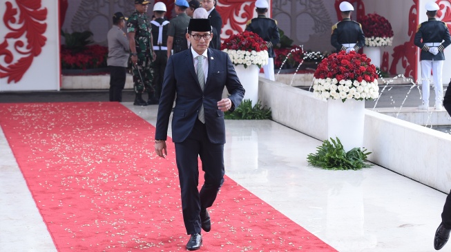 Menteri Pariwisata dan Ekonomi Kreatif (menparekraf) Sandiaga Uno saat tiba di Gedung DPR MPR, Jakarta, Jumat (16/8/2024). [Pool / Dokumentasi Parlemen]