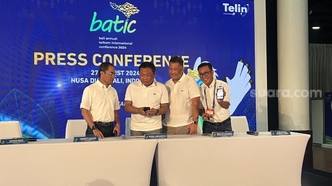 Konferensi pers Telkom BATIC 2024 yang digelar di Nusa Dua, Bali, Selasa (27/8/2024). [Suara.com/Dicky Prastya]