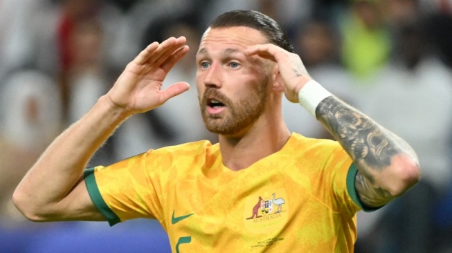 Penyerang Australia, Martin Boyle bereaksi terhadap peluang yang hilang selama pertandingan perempat final Piala Asia 2023 antara Australia vs Korea Selatan di Stadion Al-Janoub di al-Wakrah, selatan Doha, pada 2 Februari 2024.HECTOR RETAMAL / AFP.