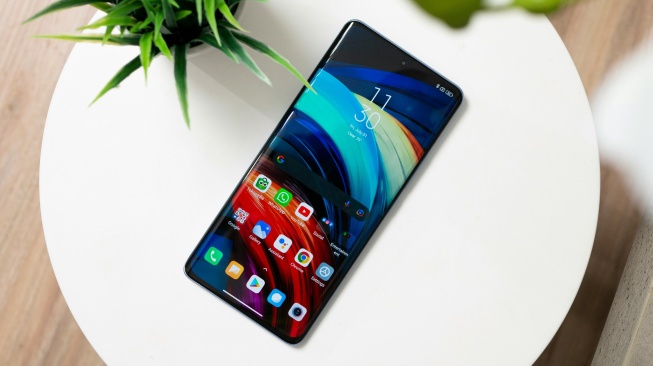 Ilustrasi HP Xiaomi. [Unsplash/Shiwa ID]