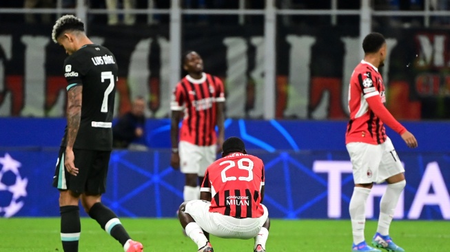 AC Milan mengalami kekalahan telak di matchday pertama Liga Champions 2024/2025. Melawan Liverpool di San Siro, tim berjuluk I Rossoneri itu dipecundangi dengan skor 1-3. [PIERO CRUCIATTI / AFP]