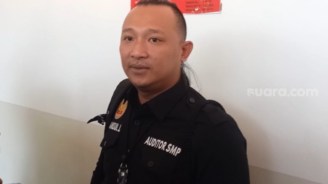 Syamsul, akademisi yang menggugat pangkat Letkol Tituler Deddy Corbuzier. [Rena Pangesti/Suara.com]