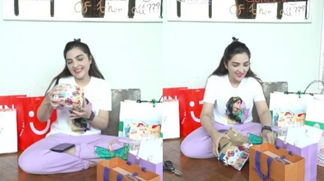 Ashanty unboxing kado ulang tahun dari ART, Suteng. (YouTube/The Hermansyah A6)