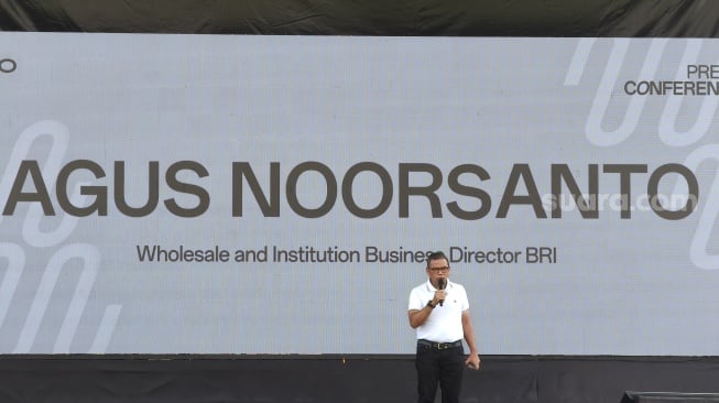 Direktur Bisnis Wholesale dan Institusi BRI, Agus Noorsanto saat konferensi pers Oppo Run 2024 di Bali, Sabtu (23/11/2024). [Suara.com/Dicky Prastya]