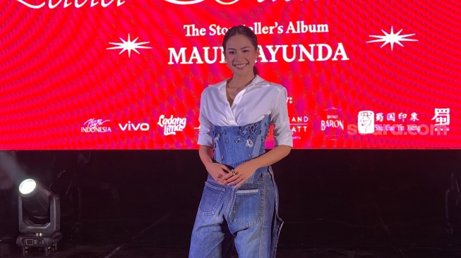 Maudy Ayunda dalam konferensi pers rilis album Pada Suatu Hari di kawasan MH. Thamrin, Jakarta Pusat, Selasa (3/12/2024). [Suara.com/Tiara Rosana]