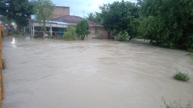 Banjir menerjang Kabupaten Serdang Bedagai. [dok BPBD Kab Serdang Bedagai]