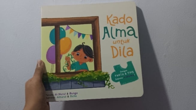 Belajar Memahami Anak Autisme Melalui Buku Kado Alma untuk Dila