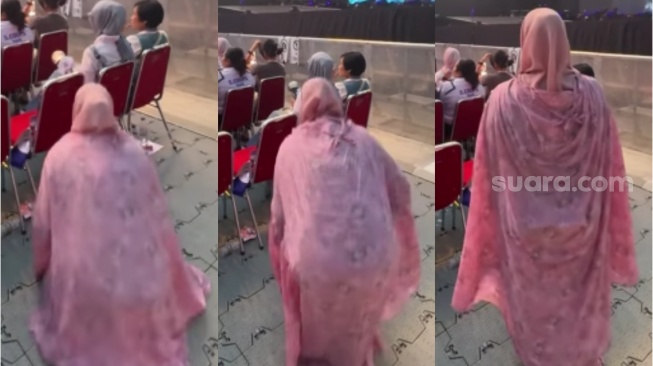 Video Viral Wanita Salat di Tengah Konser Musik Tuai Pro Kontra