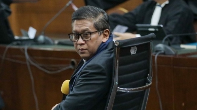 Sekretaris Jenderal DPP PDI Perjuangan, Hasto Kristiyanto, menghadiri sidang perdana di Pengadilan Tindak Pidana Korupsi, Jakarta, pada Jumat, 14 Maret 2025. [Suara.com/Alfian Winanto]