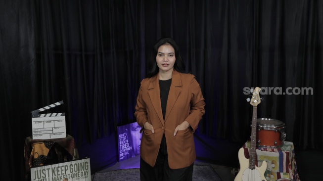 Citra Scholastika saat datang ke kantor Suara.com kawasan Mega Kuningan, Jakarta Selatan pada Selasa (22/4/2025) [Suara.com/Ade Raihan]