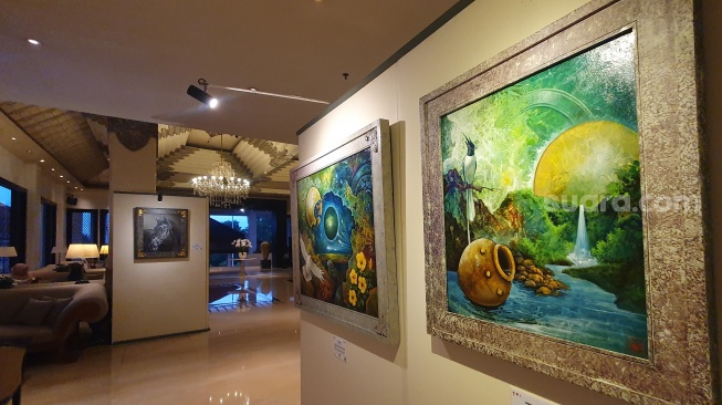 Salah satu spot lukisan di Pameran Lintas Imaji di 'Lintas Imaji: Melintas Gaya, Menyatu Dalam Imaji' di Mustika Yogyakarta Resort & Spa, Rabu (7/5/2025). [Hiskia/Suarajogja]
