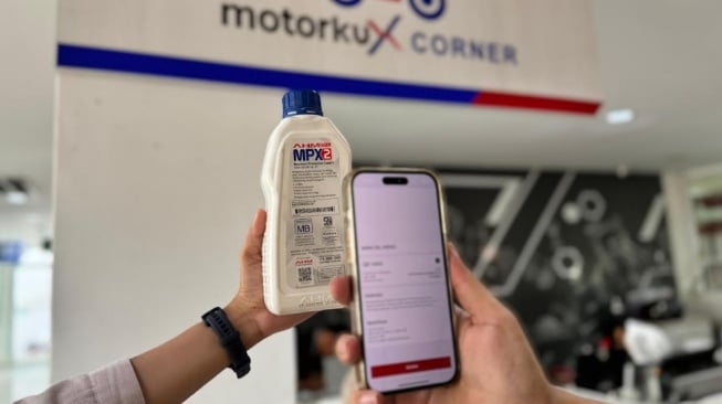 Cara aman terhindar dari pemalsuan oli AHM dengan menggunakan scan di aplikasi Motorku X (Dok. Asmo)