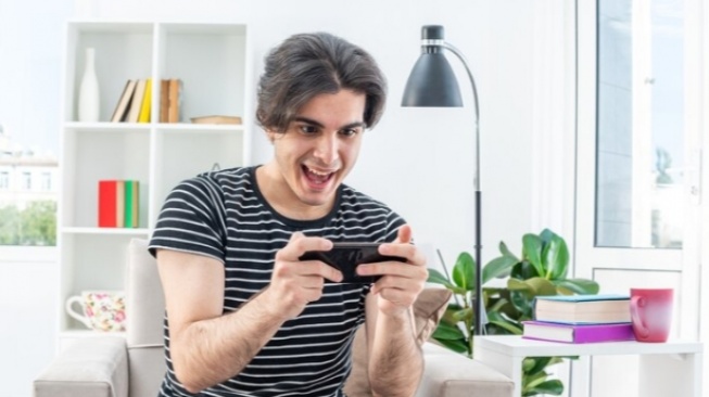ilustrasi aplikasi game penghasil uang yang benar-benar membayar (Freepik)