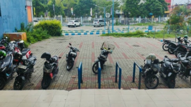parkir liar di Palembang, Sumatera Selatan