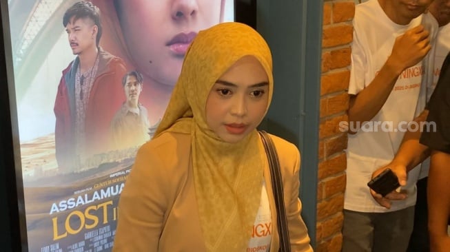 Ria Ricis, Pemain film Assalamualaikum Beijing 2: Lost in Ningxia dalam konferensi pers di kawasan MH. Thamrin, Jakarta Pusat pada Rabu, 20 Mei 2025. [Suara.com/Tiara Rosana]