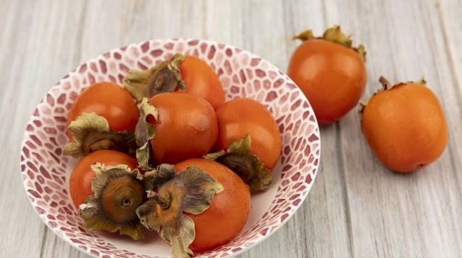 Buah kesemek. (Freepik)