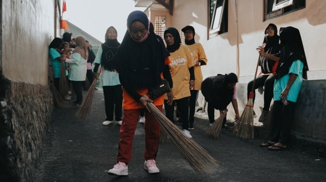 Bank Mandiri melalui penyelenggaraan Mandiri Sahabat Desa turut menjangkau 18 titik desa sepanjang jalur Mandiri Jogja Marathon (Dok: Bank Mandiri)