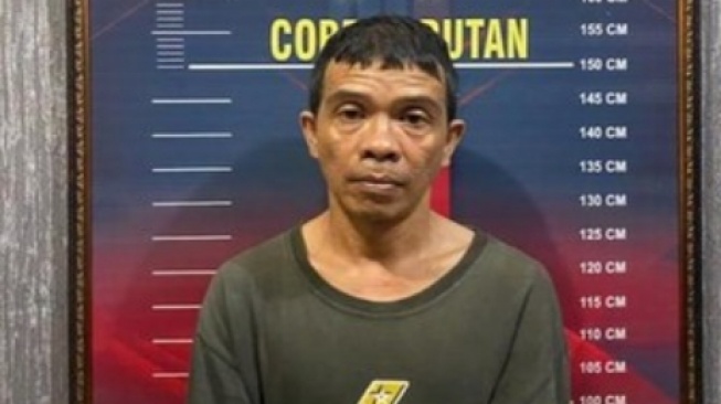 pelaku yang merantai anaknya di Banyuasin
