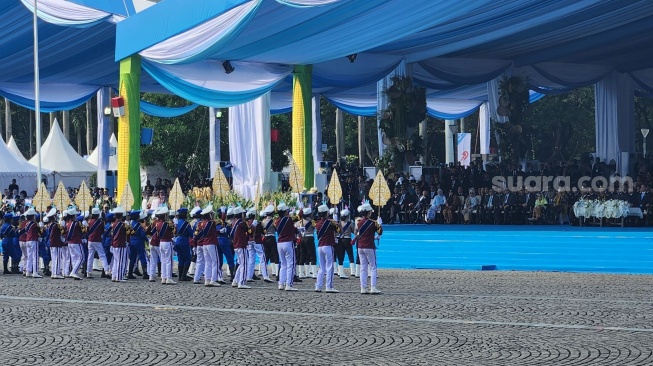 Aksi Polisi Cilik Tunas Bhayangkara di HUT Bhakayangkara ke-79 di Monas, Jakarta, Selasa (1/7/2025). [Suara.com/Fakhri]