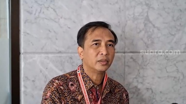 Gitaris Padi Reborn, Piyu usai menghadiri sidang lanjutan uji materi UU Hak Cipta di Mahkamah Konstitusi (MK), Jakarta Pusat, Kamis, 10 Juli 2025 [Suara.com/Adiyoga Priyambodo].