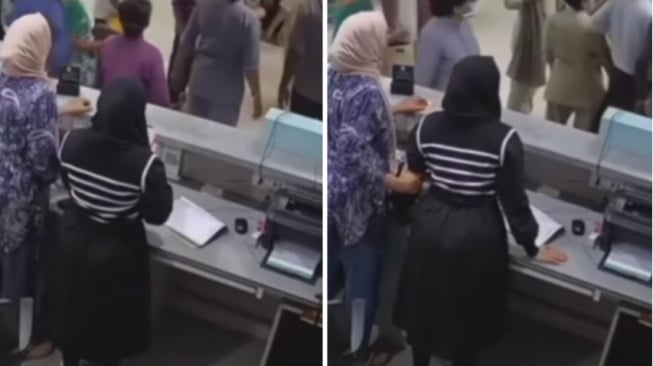 Sambil gendong bayi ibu-ibu ini ngamuk banting monitor komputer (Instagram)