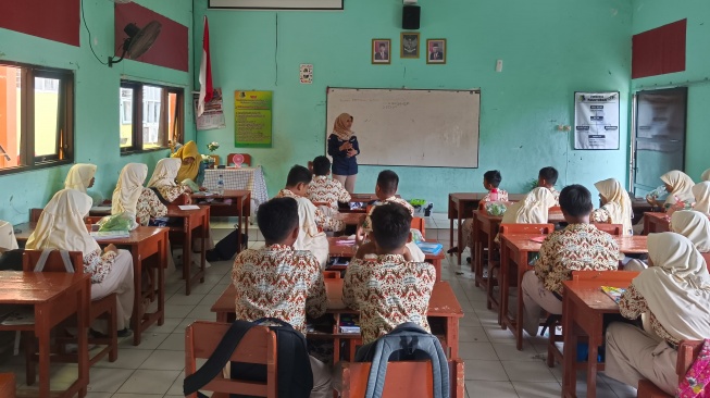 Literasi keuangan Bank Mandiri untuk tingkat sekolah menengah di SMP Negeri 2 Bojonegoro (Dok: Bank Mandiri)