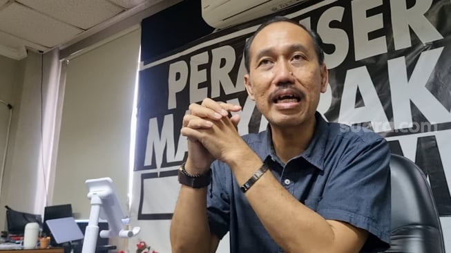 Endiarto, produser eksekutif sekaligus sutradara film Merah Putih One For All saat ditemui di kantornya di Pusat Perfilman H. Usmar Ismail di kawasan Kuningan, Jakarta Selatan pada Selasa, 12 Agustus 2025. [Suara.com/Tiara Rosana]