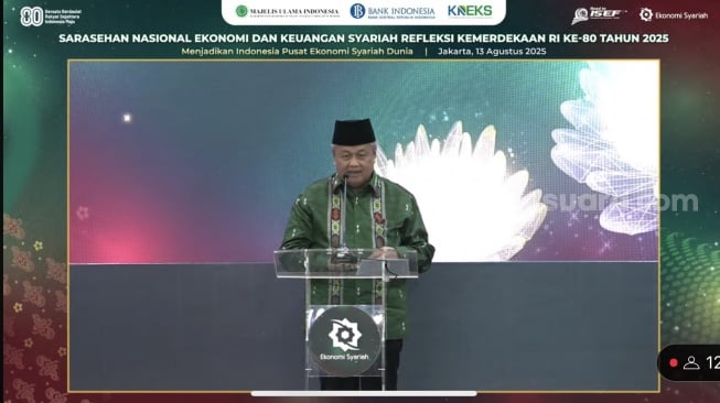 Gubernur BI Perry Warjiyo  dalam acara Sarahsehan Nasional Ekonomi Syariah secara virtual, Rabu (13/8/2025). [Suara.com/Rina]