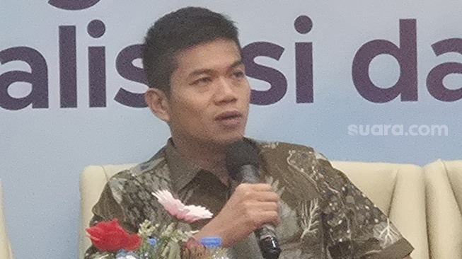 Ketua Umum APJII Muhammad Arif Angga dalam acara Digital Transformation Summit 2025, di Jakarta, Selasa (25/8/2025). [Suara.com]