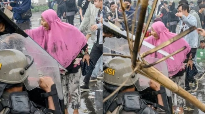 Viral Emak-emak Jilbab Pink Tantang Aparat di Demo DPR, Pulang Cuma Senyum Ditanya Anaknya