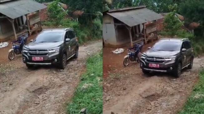 Mobil Dinas Plat Merah Tak Kuat Nanjak di Jalan Rusak, Warga Cuma Diam Tak Membantu. [Instagram/ nyinyir_update_official]