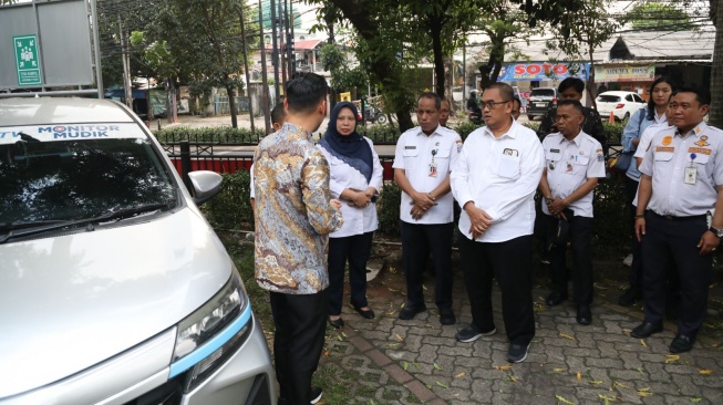 Ketua Pansus Perparkiran, Ahmad Lukman Jupiter soal praktik parkir liar di Jakarta. [DPRD Jakarta]