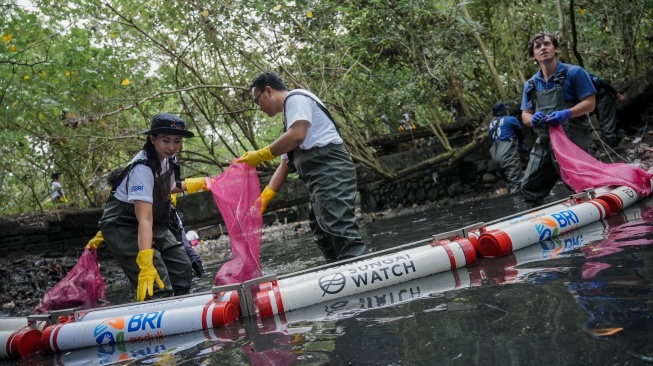 Kolaborasi BRI dan Sungai Watch Berhasil Kumpulkan Puluhan Ton Sampah Sungai