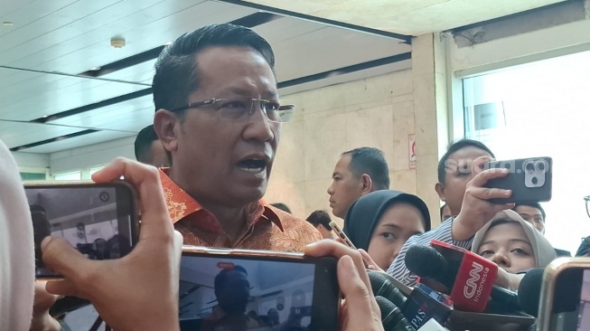 Menteri Hukum Supratman Andi Agtas mengaku sudah menandatangi Surat Keputusan (SK) pengesahan kepengurusan PPP di bawah pimpinan M Mardiono hasil Muktamar X di Ancol. (Suara.com/ Bagaskara)